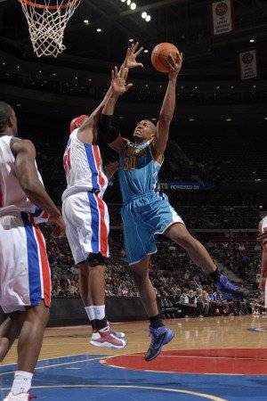 New Orleans Hornets v Detroit Pistons: David West and Charlie Villanueva Photographic Poster Print by Allen Einstein, 12x18