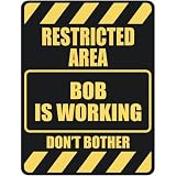 RESTRICTED AREA BOB IS WORKING  PARKING SIGN