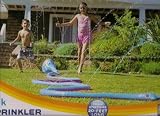 Discovery Kids Inflatable Twisty Trunk Elephant Sprinkler Water Toy (Trunk Stretches 20 Feet Long)