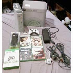 XBOX 360 CONSOLE MINT WITH BOX,20GB HARD DRIVE,4 GAMES,1 MEMORY UNIT,1 WIRELESS CONTROLLER,1 COOLING FAN WITH SWITCH AND XPLODER CHEAT SAVES SYSTEM ALL BOXED AND WORKING