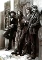Beatles (Leaning Against Wall) Music Poster Print - 11" X 17"