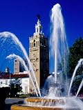 Fountain with Giralda Bell Tower Behind, Country Club Plaza, Kansas City, USA Photographic Poster Print by Richard Cummins, 12x16