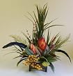 Red Repen and Feathers Floral Arrangement