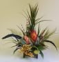 Red Repen and Feathers Floral Arrangement