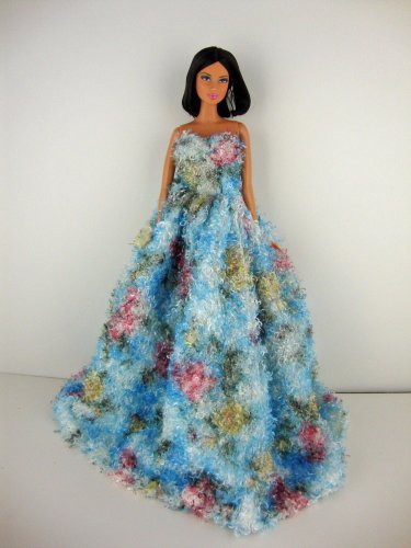 A Blue Ball Gown with Soft Textured Floral Details Made to Fit the Barbie Doll