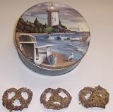 Scott's Cakes Milk Chocolate Covered Pretzel with Walnuts in a Mini Lighthouse Tin