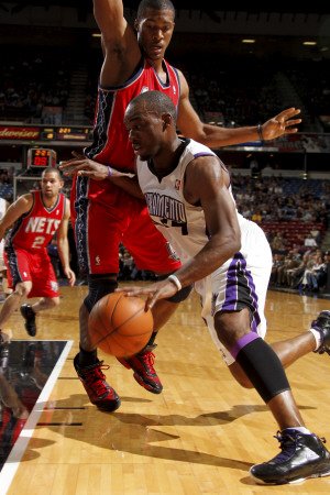 New Jersey Nets v Sacramento Kings: Carl Landry and Derrick Favors Photographic Poster Print by Don Smith, 24x36