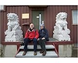 Photographic Print of British tourists pose on the steps of the Chinese research from ArcticPhoto