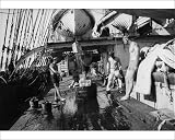 Photographic Prints of In the Doldrums after heavy rains, bathing on the well-deck from National Maritime Museum