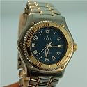 Vintage/Antique watch: Men's Ebel Discovery 18k Gold and Stainless Steel Watch with Blue Dial and Original Metal Link Band 1990's