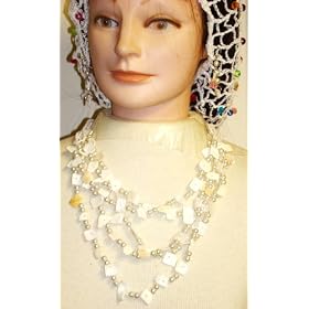 Click here to buy Five Strand Small White Pearls and Sea Shells Long Necklace and Earrings for Women and Teens by Gita.