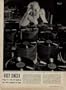 BUSY SINGER - Singer PEGGY LEE leans on a stack of records of her hit tune "Manana." This record alone could bring in $75,000 in royalties in 1948. ..... 1948 LIFE Magazine Article, A4801.