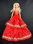 A Christmas Ball Gown in Red with Gold Accents with Red Shawl Made to Fit the Barbie Doll