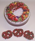 Scott's Cakes 1 lb. White Chocolate Covered Pretzel with Christmas Jimmies in a Wreath Tin