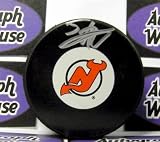 Adam Larsson autographed Hockey Puck (New Jersey Devils) - Autographed NHL Pucks