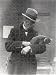 Jigsaw of Superintendent R. I. Pocock with Kinkajou, 1914 from ZSL Print Store