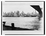 Historic Print (L): Manhattan's changing skyline--20-story buildings are being torn down to make room for 40