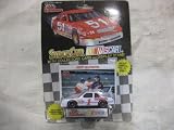 NASCAR #1 Jeff Gordon Baby Ruth Racing Team Stock Car With Driver's Collectors Card And Display Stand. Racing Champions Black Background Red Series 51 Car