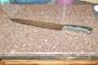 Daniel Boulud 10-Inch Flexible Slicing Knife with Gratons, Black Handle
