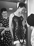 Woman Modeling Lingerie For Customers at Neiman Marcus Department Store Photographic Poster Print by Nina Leen, 18x24