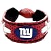 Show off your favorite team by wearing this stylish officially licensed NFL football bracelet from 
GameWear.  Each bracelet is made from authentic football leather and is boldly emblazoned with the 
team logo and colors.   Bracelets are one-size-fits-all and have a unique elastic football bead 
closure.  Available in multiple styles and players!