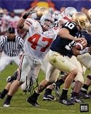AJ Hawk Autographed Ohio State Buckeyes 8x10 Photo sacking Brady Quinn