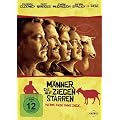 M�nner, die auf Ziegen starren