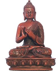 Nepali Buddha, turning the wheel of the dharma, red finish