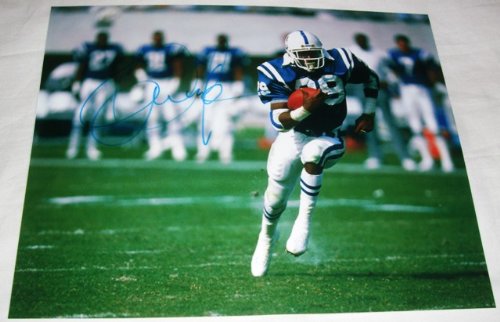 Eric Dickerson Autographed Indianapolis Colts 8x10 Photo W/PROOF, Picture of Eric Signing For, Los Angeles Rams, Indianapolis Colts, Los Angeles Raiders, Atlanta Falcons, Southern Methodist University Mustangs, Pony Express, 2105 Single Season Rushing Record