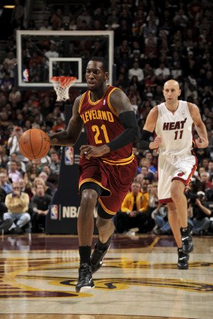 Miami Heat v Cleveland Cavaliers: J.J. Hickson and Zydrunas Ilgauskas Photographic Poster Print by David Liam Kyle, 24x36