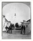 Historic Print (L): Main entrance to Fort Garland, Colorado.
