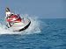 Young Woman Riding a Jet Ski
