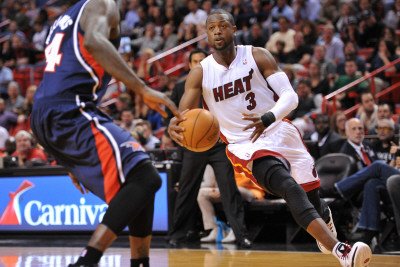 Atlanta Hawks v Miami Heat: Dwyane Wade and Marvin Williams Photographic Poster Print by NBA Photos, 28x42
