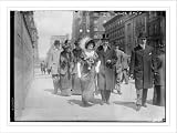 Newswire Photo (L): 5th Ave. - Easter 1911