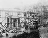 1930 Jan. 15. photo Executive offices undergoing repairs graphic. Scaffolding around the exterior of