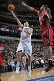 New Jersey Nets v Dallas Mavericks: Dirk Nowitzki and Brook Lopez Photographic Poster Print by Glenn James, 28x42