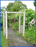 The Bloomfield Adjustable Width Tan Vinyl Arbor