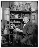 Photo Reprint Collecting old bottles is hobby of retired professor. Washington - D.C. - Nov. 27. Bottles here - 