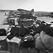 Airplanes Sitting on Airstrip at Airfield and Supplies Sitting in Trucks Photographic...