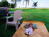Boy Sleeping Outside Vaoto Lodge, Manua'a Islands, American Samoa Photographic Poster Print by Peter Hendrie, 16x12