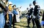 Anti-Vietnam Demonstration (Girl Giving Police Flower) Archival Photo Poster - 13x19