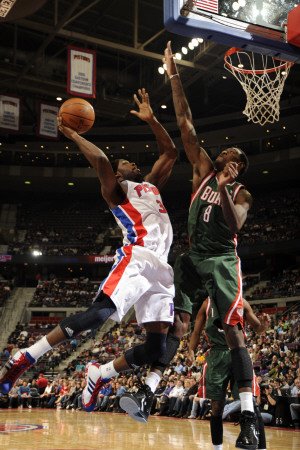 Milwaukee Bucks v Detroit Pistons: Rodney Stuckey and Larry Sanders Photographic Poster Print by Allen Einstein, 28x42