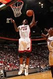 Charlotte Bobcats v Miami Heat: Udonis Haslem Photographic Poster Print by Victor Baldizon, 28x42