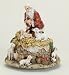 The Kneeling Santa Claus with Baby Jesus Musical Christmas Figure