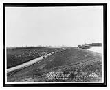 Historic Print (M): Near Geismar - showing men at work on levee where slide occurred / Ewing, Inc., Baton Ro