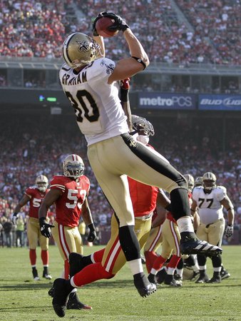 San Francisco 49ers and New Orleans Saints: Jimmy Graham and Patrick Willis Photographic Poster Print by Paul Sakuma, 24x32