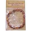 Elastic Olive wood religious bracelet with Silver tone Crucifix *** packed as a gift with special Certificate of Authenticity and origin and a FREE Lord's Prayer gift card