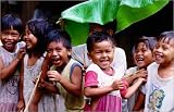 canvas Children with banana leaf, near Ardent Spring. in size: 30 x 20 cm by T. Cockrem