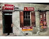 Photographic Prints of MISSISSIPPI STORE FRONT. Store front with soft drink signs in Natchez, from Granger Art on Demand
