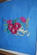 Embroidered Medium Blue T with Pink Flowers Adult-L